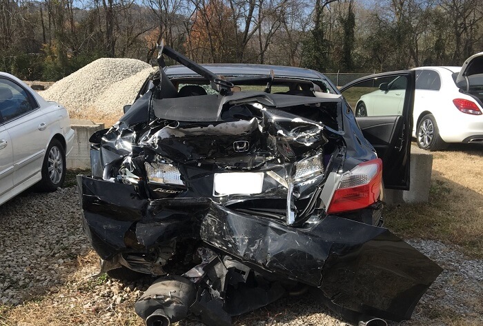 The back of a wrecked Honda Accord