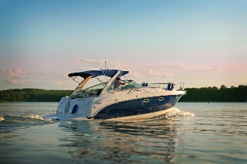 Speed Boat Traveling Across a Lake