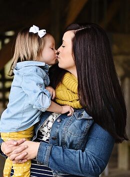 Our client with her young daughter