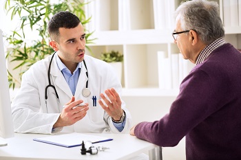 Primary care doctor treating car accident patient