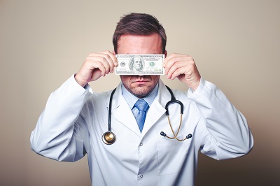 Greedy IME Doctor holding money