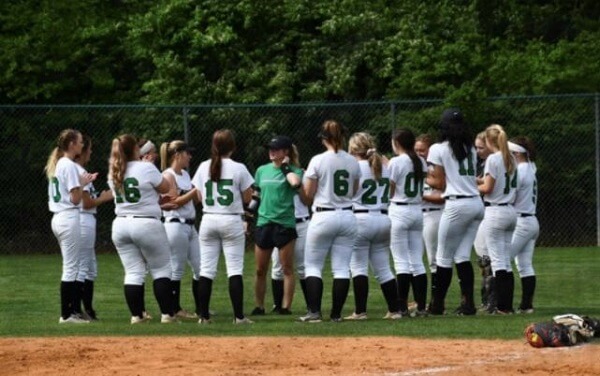 Lexie coaching girls softball