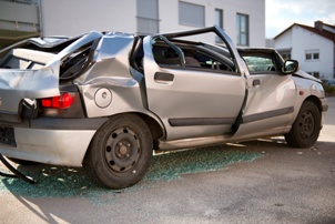 SUV with crushed rood from rollover crash