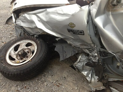 Front drivers side of wrecked F150 truck