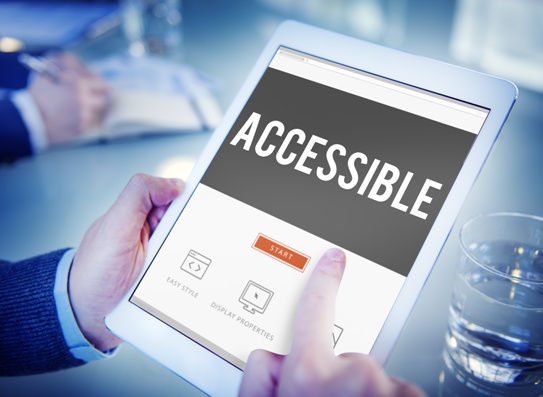 man using tablet with accessibility for disabilities