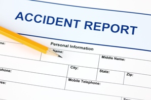 blank accident report form and pencil