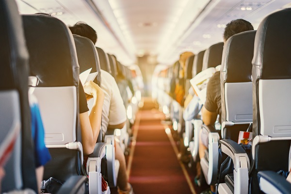 picture of passengers sitting in an airplane