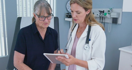 doctor and patient going over notes