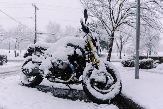 motorcycle covered in snow