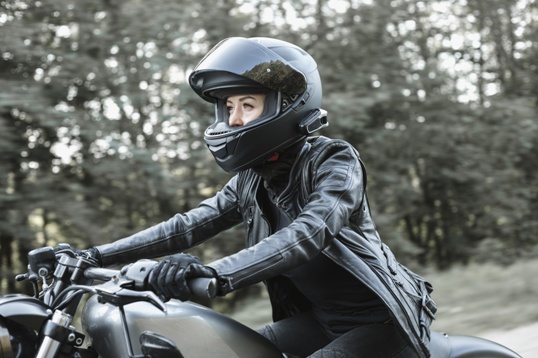 woman riding motorcycle