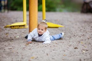 young child injured in playground fall accident