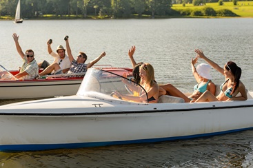 Friends Having a Party on a Few Boats