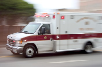 ambulance rushing from an accident scene