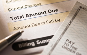 billing statement pen and checkbook