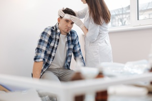 car accident victim being treated for concussion