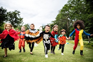 children-running-Halloween-costumes
