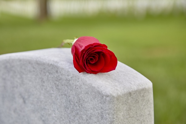 headstone with rose wrongful death