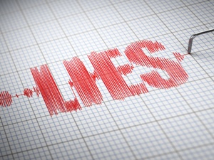 lie detector printout with the word lies in red ink