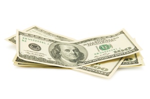 pile of 100 dollar bills