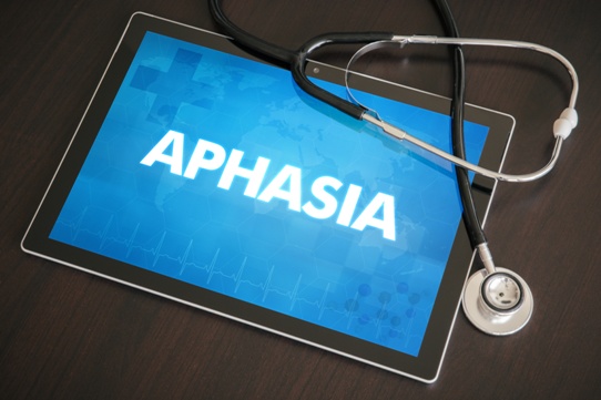 tablet with word aphasia and stethoscope