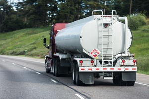 tanker truck driving down the road