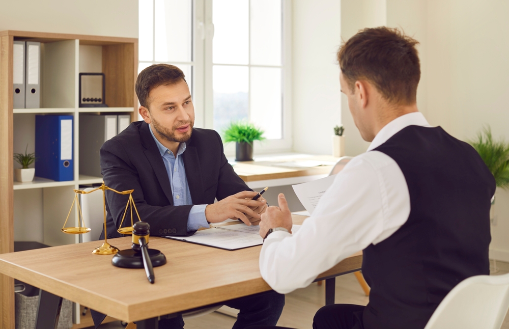 Consulting with a lawyer. Learn when to hire a personal injury lawyer.